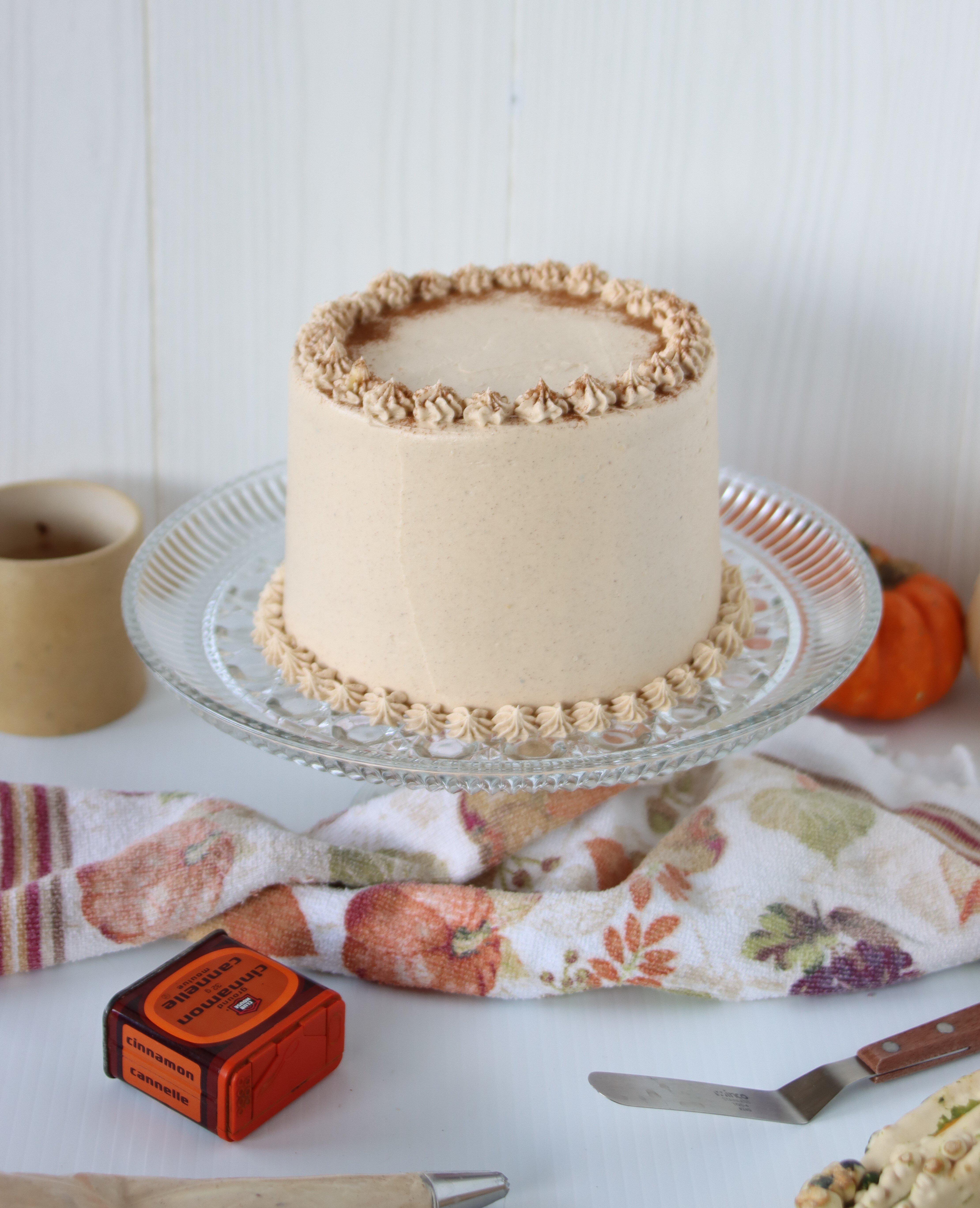 Pumpkin Cake with Espresso Spice Buttercream image. Full cake exterior, not sliced.