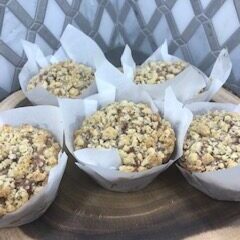 Order now delicious baked goods from A Pound of Butter! Photo of apple cinnamon coffee cake muffins.